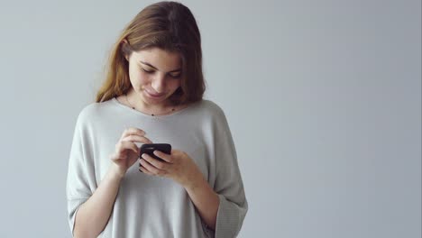 Young-woman-using-mobile-phon