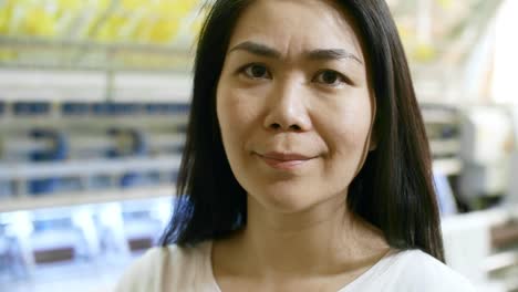 Middle-Aged-Asian-Woman-at-Textile-Factory