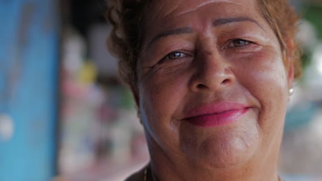 Panning-portrait-of-an-older-hispanic-woman-smiling-into-the-camera-in-Mexico