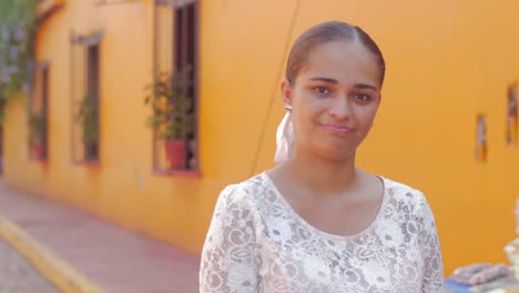 A-beautiful-hispanic-woman-smiles-at-the-camera-in-Mexico