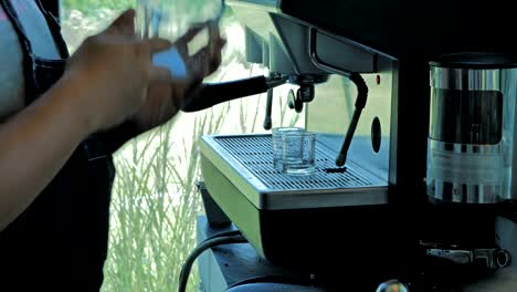 Professional-barista-is-preparing-ground-for-double-shot-of-espresso