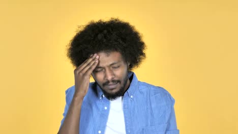 Afro-American-Man-with-Headache-on-Yellow-Background