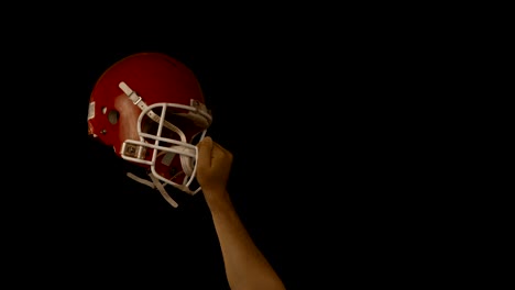 Jugador-de-Rugby-tiene-su-casco-en-el-aire