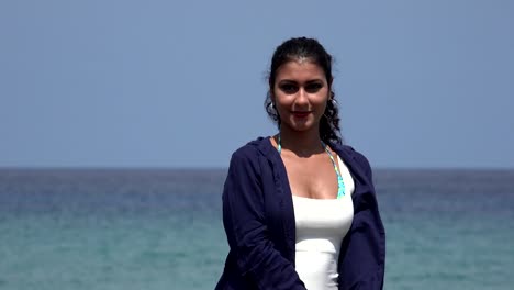 Tourist-Woman-Posing-At-Ocean