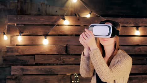 Young-woman-using-Virtual-Reality-Glasses