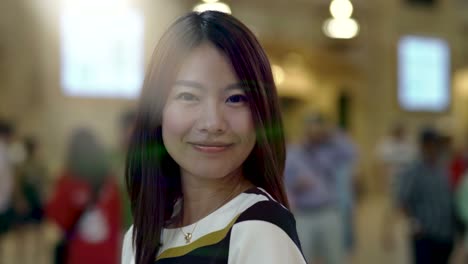 Attractive-Chinese-Woman-in-Urban-Environment.-Looking-at-the-Camera-with-Dark-Eyes-and-Dyed-Hair.