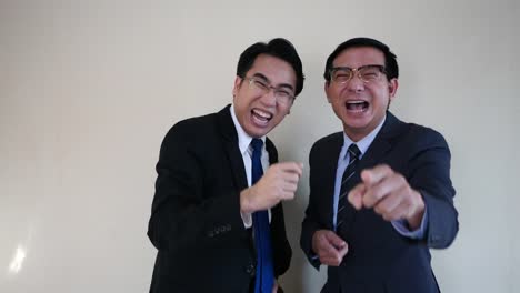 Two-businessman-laughing.