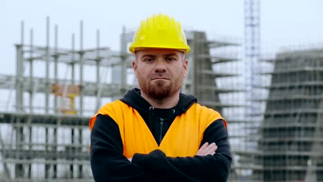 construction-worker-looks-at-the-camera-proud