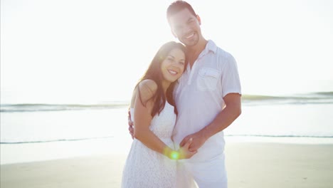 Portrait-of-beautiful-Latin-American-couple-on-beach