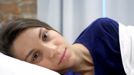 Close-Up-of-Hispanic-Woman-Getting-Bored,-Lying--in-Bed