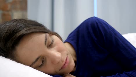 Hispanic-Woman-Waking-Up-and-Leaving-Bed-in-Morning