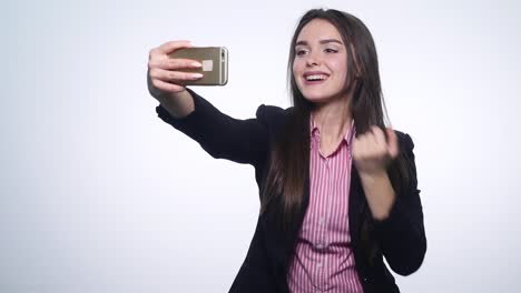 Girl-doing-self-phone-on-a-white-background