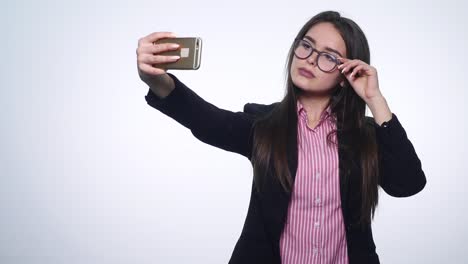 Girl-doing-self-phone-on-a-white-background