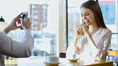 Man-Taking-Photos-of-Girlfriend