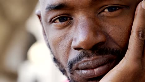 Pensive-look-of-a-young-African-black-man--close-up