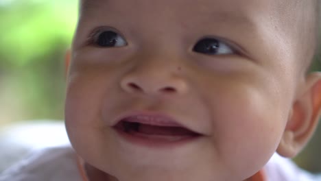 Happy-portrait-baby-boy-playing-alone