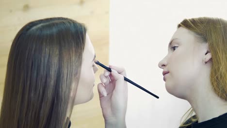 Makeup-Artist-Applying-Eye-Shadow