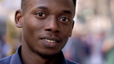 happy-attractive-young-american-african-man-smiling-at-camera