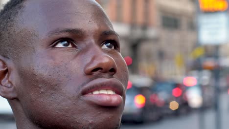 hope,-future.Young-hopeful-man-is-looking-up-at-the-sky---close-up