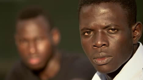 portarit-of-Young--african-men-staring-at-camera---change-of-focus