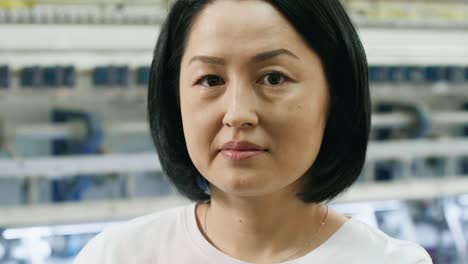 Asian-Woman-Posing-in-Textile-Factory