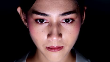 Close-up-on-woman's-eyes-at-night.