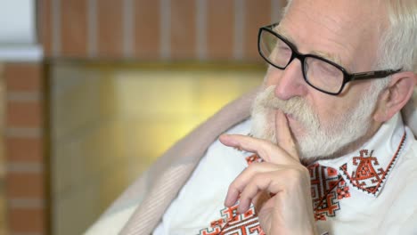 Portrait-of-the-old-man-sitting-in-the-rocking-chair