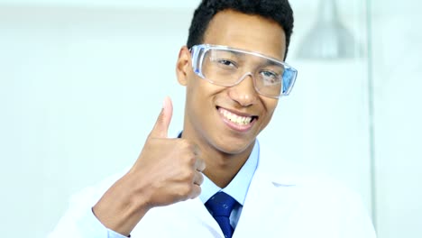 Portrait-of-Thumbs-Up-by-Scientist,-Doctor,-Surgeon-in-Protective-Glasses