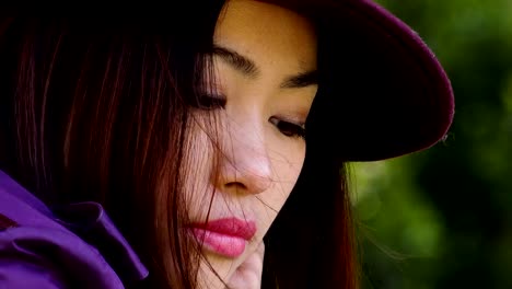 pensive-sophisticated-Asian-Woman-Portrait