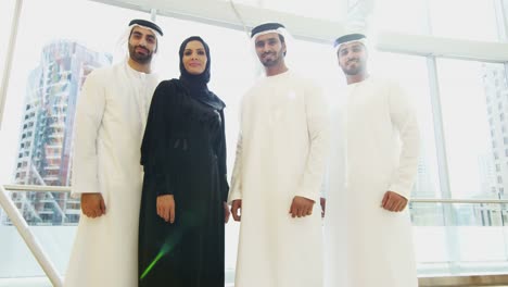 Portrait-male-female-Arabic-business-team-national-dress