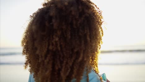 Portrait-of-African-American-female-resting-at-sunset