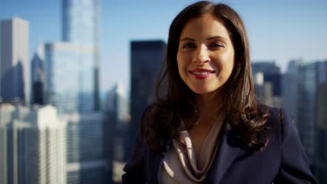 Portrait-of-Hispanic-female-consultant-on-Chicago-rooftop