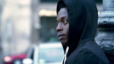 Sad-pensive-lonely-young-black-african-man-in-the-street