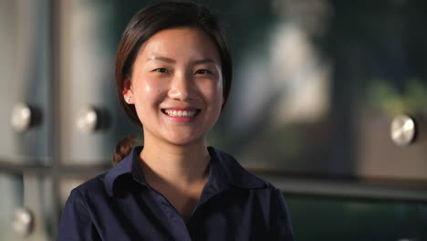 Portrait-of-Happy-Young-Chinese-woman-smile-at-camera-in-Slow-Motion,-4k