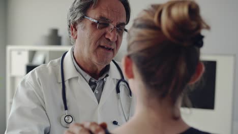 Doctor-and-patient-are-discussing-at-clinic