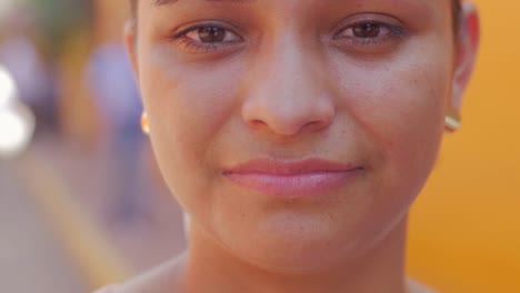 A-beautiful-young-hispanic-woman-looking-upset-and-smiles-while-looking-at-the-camera-in-Mexico