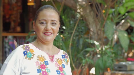 A-beautiful-hispanic-woman-smiles-at-the-camera-in-Mexico