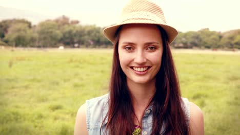 Happy-woman-holding-potted-flowers