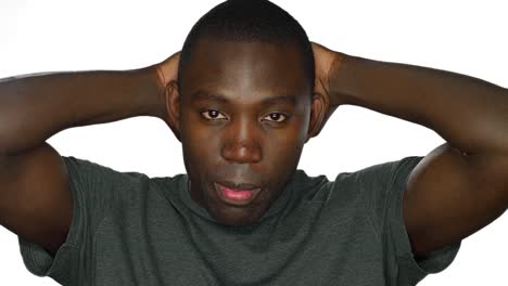 Stressed-young-man,-on-a-white-studio-background