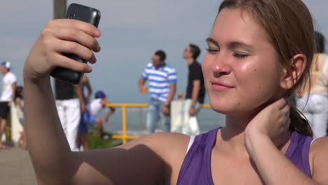 Female-Tourist-Taking-A-Selfie