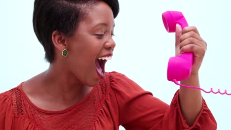 Happy-Young-Woman-holding-pink-telephone