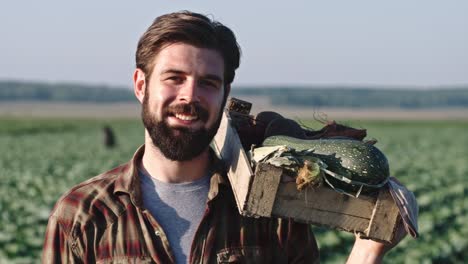 Young-Farmer-with-Fresh-Harvest