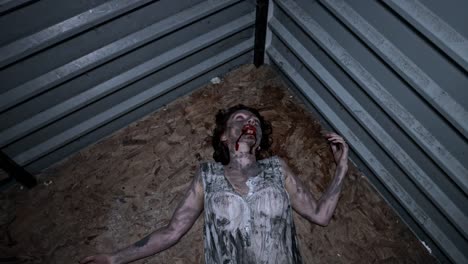 4k-Horror-Shot-of-a-Dirty-Zombie-Woman-Moving-Weird