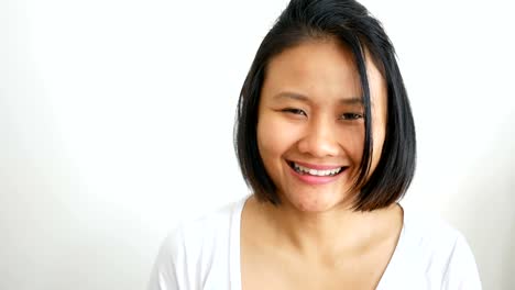 Woman-starting-to-smile-to-camera