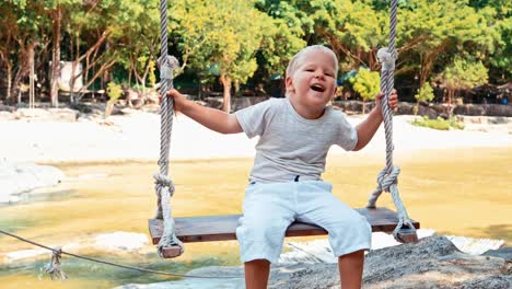 Boy-on-a-swing