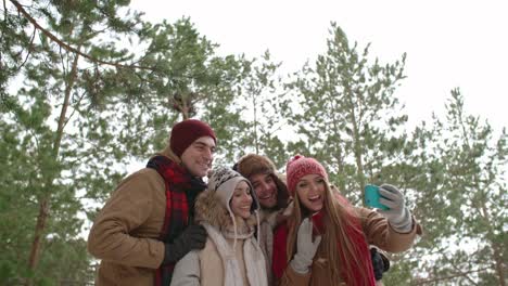 Young-People-Taking-Selfie-on-Nature-at-Winter