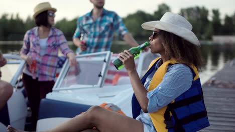 Woman-posing-while-partying-with-friends