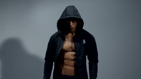 Fitness-Model-Wearing-an-Unzipped-Hooded-Sweatshirt