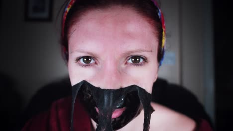 4K-Woman-Taking-off-Black-Mask-Pores-In-Mirror