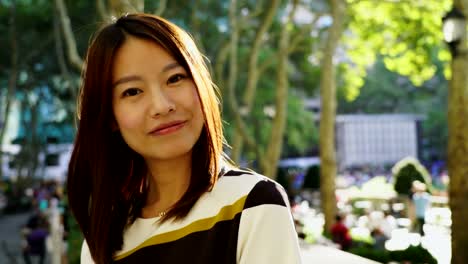 Attractive-Chinese-Woman-in-Urban-Environment.-Looking-at-the-Camera-with-Dark-Eyes-and-Dyed-Hair.